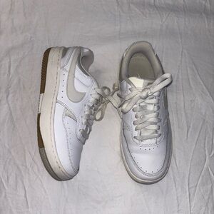 White and cream Nike sneakers